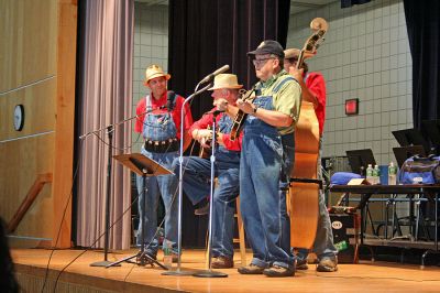 Rochester Resonators
The student body of Rochester Memorial School received a gift from the schools Parents-Teachers Organization (PTO) to mark the beginning of the school year on Friday, September 7 in the form of a concert by local favorites The Resonators. The band played two shows of what they bill as a Slice of Americana in the schools cafeteria to accommodate the entire school population. (Photo by Robert Chiarito).
