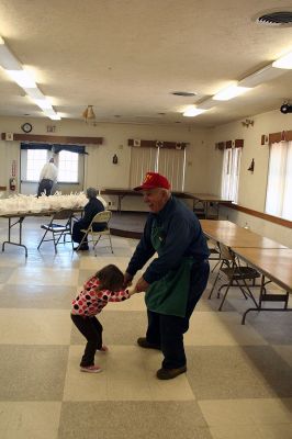 Marion Take-Out
Members of the Benjamin D. Cushing Post 2425 Veterans of Foreign Wars, Marion prepared Texas Style Chicken Barbeque take out dinners on Sunday April 5 at the Post's Pavillion on Route Six. The dinners gave residents the chance to sample a hearty helping of Chef Ron Barros' special BBQ sauce recipe with all of the trimming for a $10.00 donation. (Photo by Robert Chiarito)
